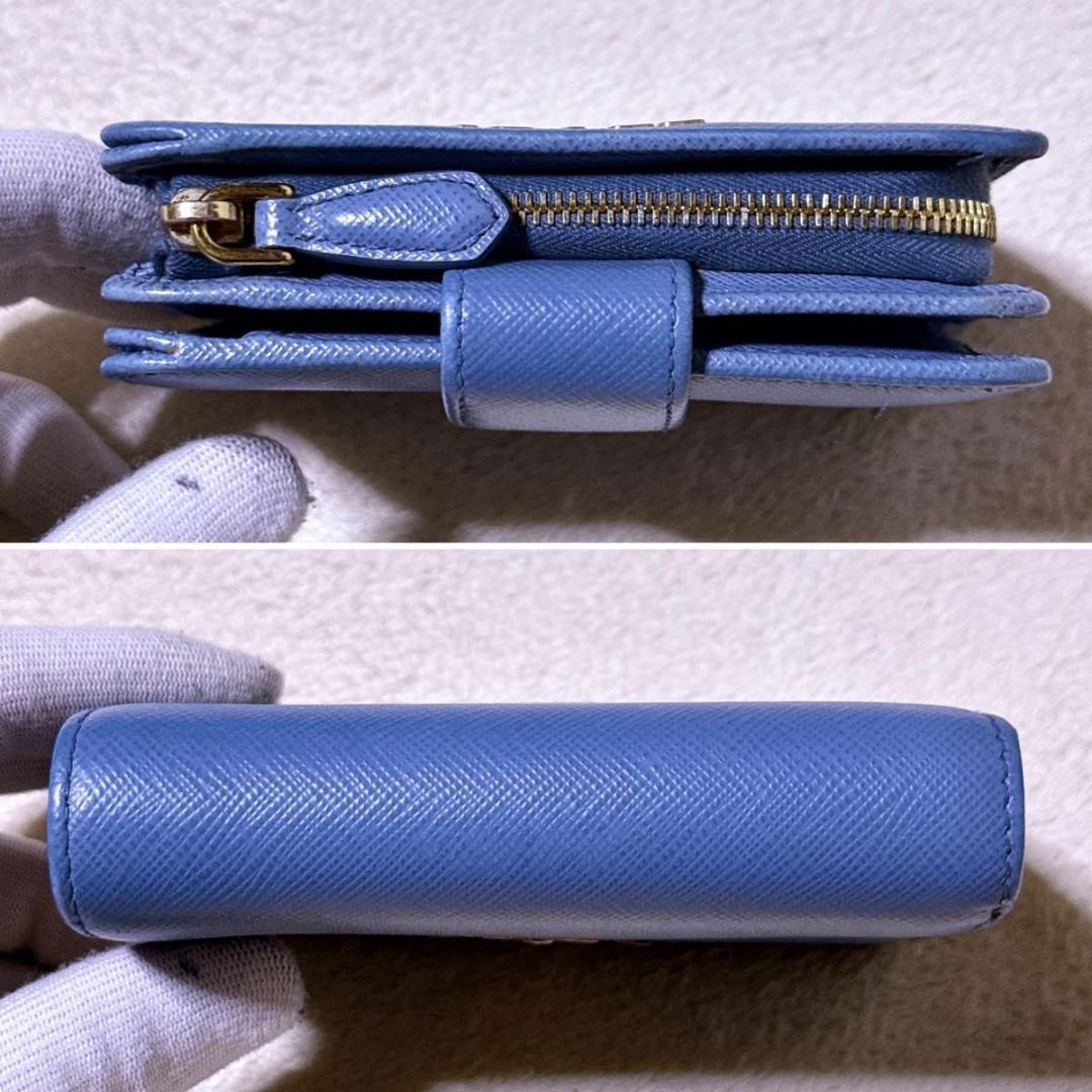 RFID【極美品】プラダ 1ML018 サフィアーノ 折り財布 メタルロゴ 水色